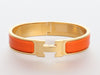 Hermès Narrow Orange Enamel Clic-Clac Bracelet