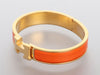 Hermès Narrow Orange Enamel Clic-Clac Bracelet