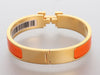 Hermès Narrow Orange Enamel Clic-Clac Bracelet