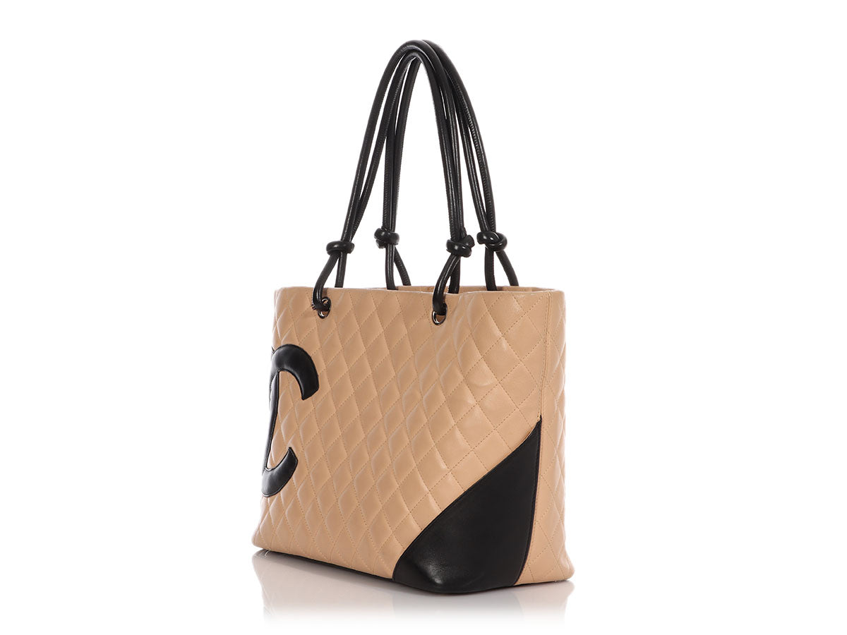 CHA🤍NEL Calfskin Snakeskin Quilted small Cambon tote in very good