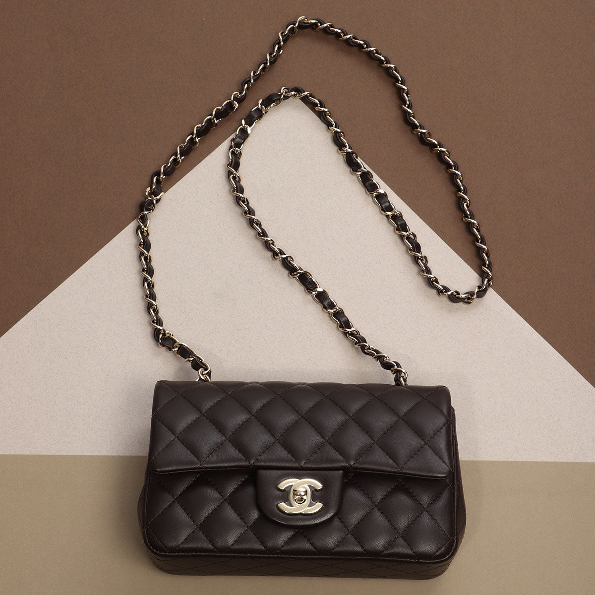 Get your hands on this classic and stylish Chanel Brown Lambskin