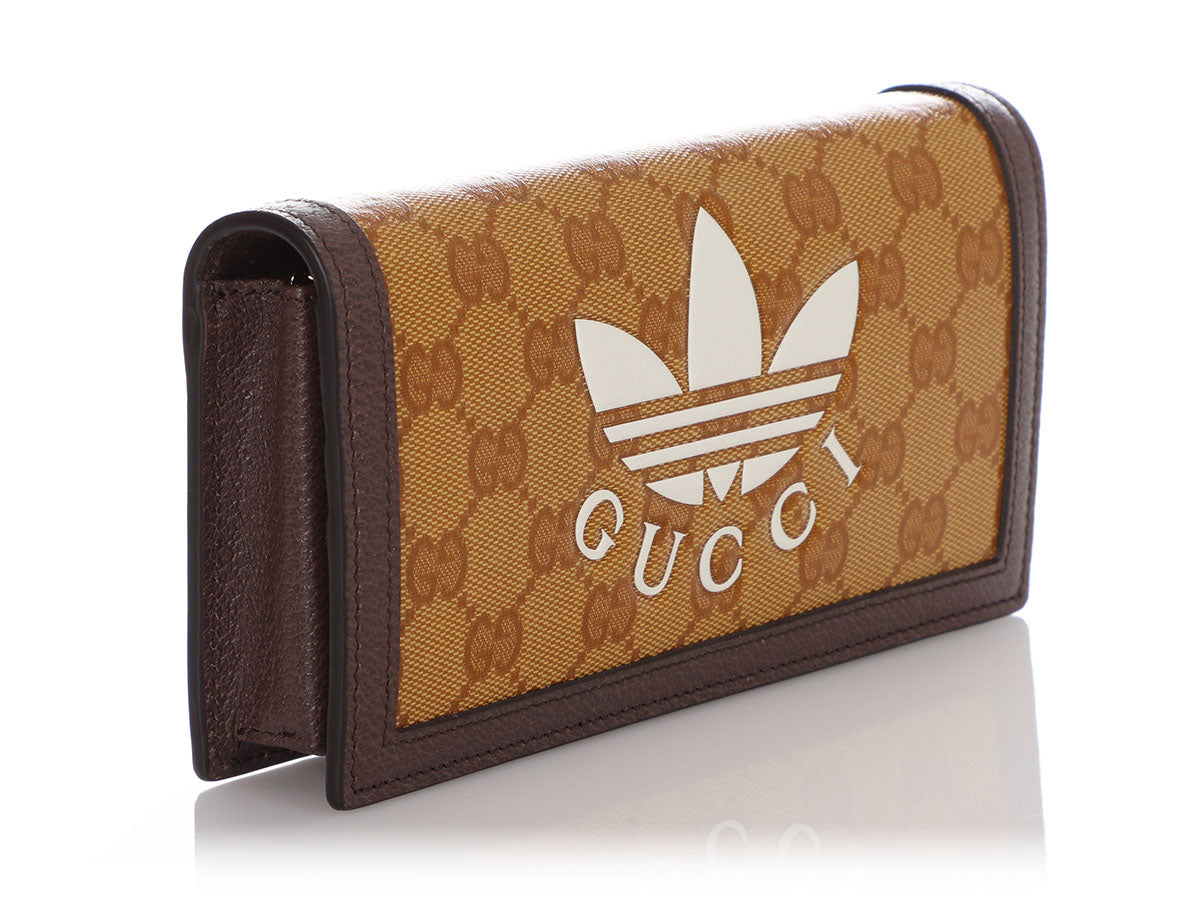 GUCCI Leather-Trimmed Monogrammed Crystal Canvas Billfold Wallet
